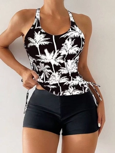 Two-piece tankini set featuring coconut print top with drawstrings and high-waisted shorts