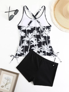 Women's tankini swimsuit with palm print top and black boyleg bottoms set