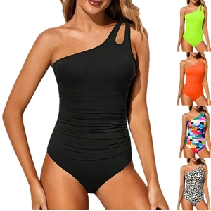 Slimming one-shoulder one-piece swimsuit in multiple colors with hollow out details