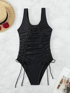 Elegant black one-piece swimsuit with ruched texture and side drawstrings for pool vacation