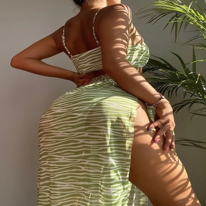 Detailed view of sexy green zebra print bikini with a high-slit mesh beach sarong