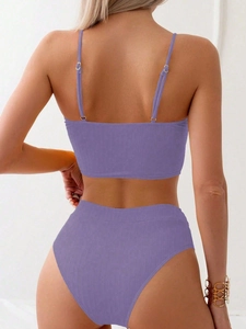 Detail view of the lavender ribbed bikini back showing adjustable straps and metal ring buckles