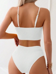 Rear view of white ribbed bikini with adjustable straps and high waisted bottom style