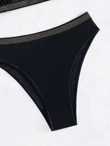 Sexy black high waisted bikini bottom with shimmering silver rhinestone waistband detail