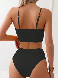 Back view of black ribbed bikini showing adjustable straps and high waisted bottom