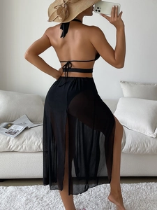 Three-piece black swimsuit set with halter bikini and sheer side-slit mesh maxi dress