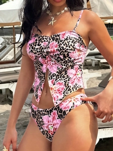 Two-piece tankini set featuring leopard and floral print with beach holiday aesthetics