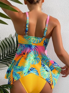 Rear view of floral tankini top with adjustable straps and yellow bikini bottom