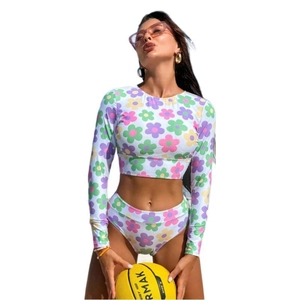 Floral two-piece long sleeve swimsuit set with high waist bikini bottom and daisy print