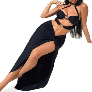 Women's black 2-piece set featuring a halter neck top and high slit maxi skirt with gold hardware