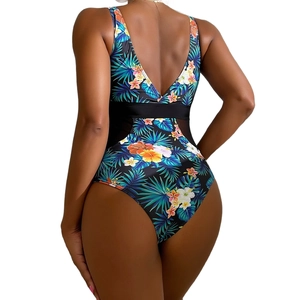 Peacock blue one-piece swimsuit with tropical print and black mesh cutout back design
