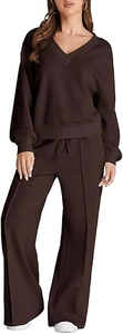 Detailed view of dark brown V-neck sweatshirt with matching wide-leg trousers and front seams