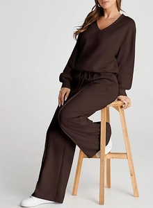 Detail view of coffee knit lounge set with V-neck top and drawstring hemline