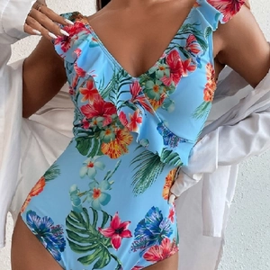 Floral print one-piece swimsuit in light blue with deep V-neck and ruffle trim details