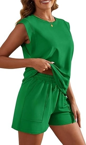 Detail of green summer two-piece set featuring sleeveless top and pocketed shorts