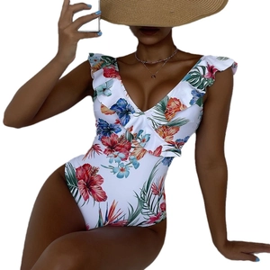Women's deep V-neck one-piece swimsuit with tropical floral print and ruffled shoulders
