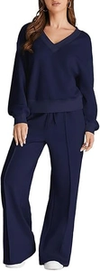 Detailed view of navy blue V-neck sweatshirt and straight wide-leg pants two-piece set