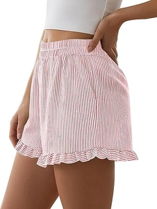 Detail of pink striped summer shorts with elastic waist and ruffled hem for women