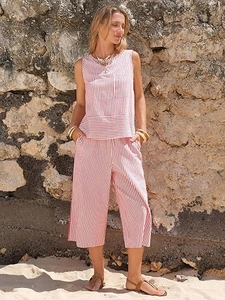 Detail of red striped sleeveless top and wide leg pants for summer beach vacations