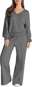 Detail view of grey V-neck sweatshirt and drawstring wide-leg pants loungewear set