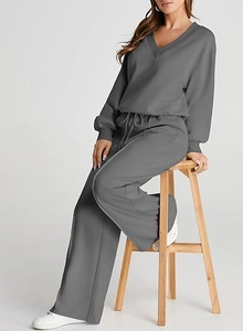 Detail of dark grey V-neck sweatshirt and drawstring wide-leg pants leisure set