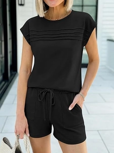 Detail of the pleated chest design and drawstring shorts on this black summer leisure set