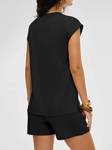 Back view of black casual two-piece set featuring cap sleeve top and matching shorts