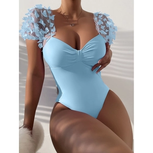Light blue one-piece swimsuit with 3D butterfly appliques and mesh puff sleeves