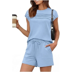 Detail view of light blue summer set showing the pleated texture and drawstring waist