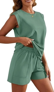 Detailed view of women sleeveless top and drawstring shorts with side pockets in green