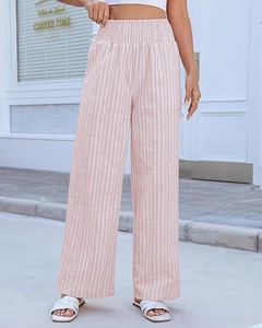 Detail of pink and white striped wide-leg trousers with elastic high-waist design
