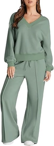 Detail of sage green lounge set featuring a V-neck sweatshirt and drawstring wide-leg pants