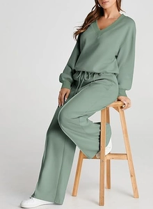 Detail view of V-neck sage green loungewear set with drawstring wide-leg pants