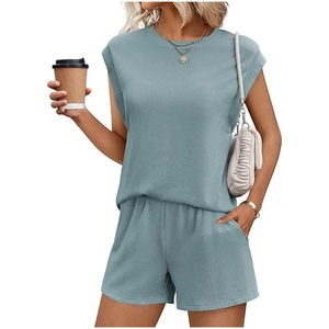 Casual two-piece dusty blue ribbed knit set with cap sleeve top and elastic shorts
