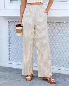 Close-up of high waisted vertical striped wide leg pants with comfortable elastic waistband
