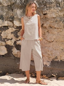 Detail of linen stripe sleeveless top and wide-leg trousers set with pocket detail