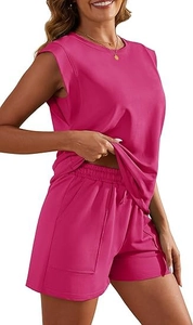 Detail view of pink sleeveless top and matching elastic waist shorts with pockets