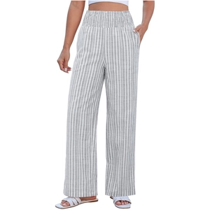 Close-up of smocked high waist detail and grey vertical stripes on wide leg trousers