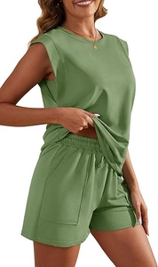 Detail of green sleeveless crewneck top and matching elastic waist shorts with pockets