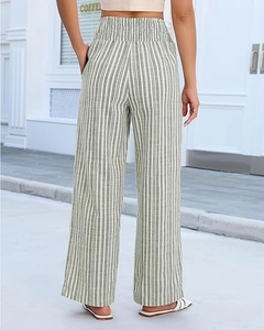 Detail view of women's high-waist striped wide-leg pants from a back-angle perspective