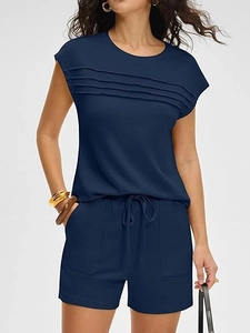 Detailed view of women's dark blue summer casual set with textured horizontal pleat accents