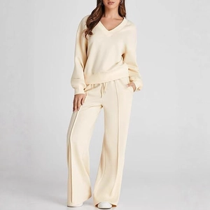 Women's two-piece casual knit set with V-neck pullover and high-waist wide-leg pants in beige