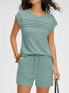 Close-up of pleated texture and drawstring waist on summer leisure two-piece set