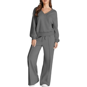 Women's dark grey two-piece set featuring a V-neck sweatshirt and drawstring wide-leg pants