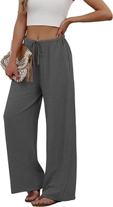 Close-up detail of dark grey wide-leg pants with elastic drawstring waist and crepe texture