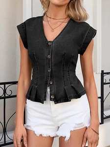 Detail of V-neck black denim vest with button-down front and peplum ruffled hemline