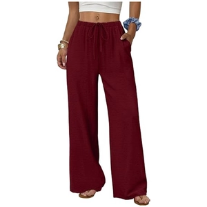 Detail of high waist wide leg pants showing elastic drawstring and side pockets