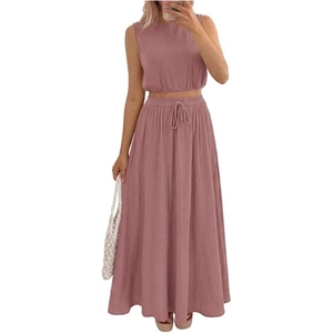 Detailed texture of sleeveless crop top and high-waisted drawstring skirt in dusty rose