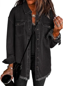 Close-up of black washed denim shirt jacket featuring raw frayed hem and utility pockets