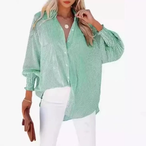 Relaxed fit green and white striped long sleeve shirt with feminine ruffled elastic cuffs